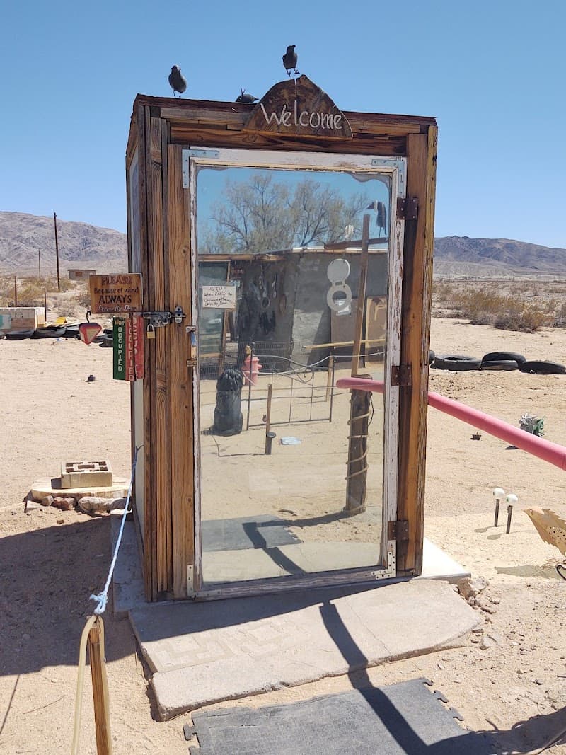 Glass Outhouse Art Gallery